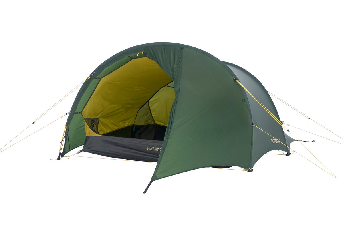 Green camping tent with yellow interior on a white background